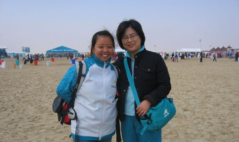 03 Shirley and her colleague at the Doha 2006 Asian Games, her first international representation as an ITO