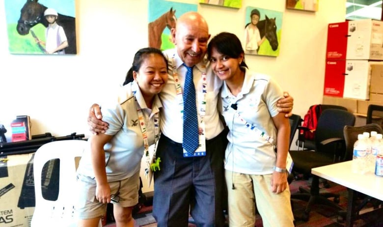 11 Shirley and a colleague posing with mentor and equestrian Olympian, Paul Weir