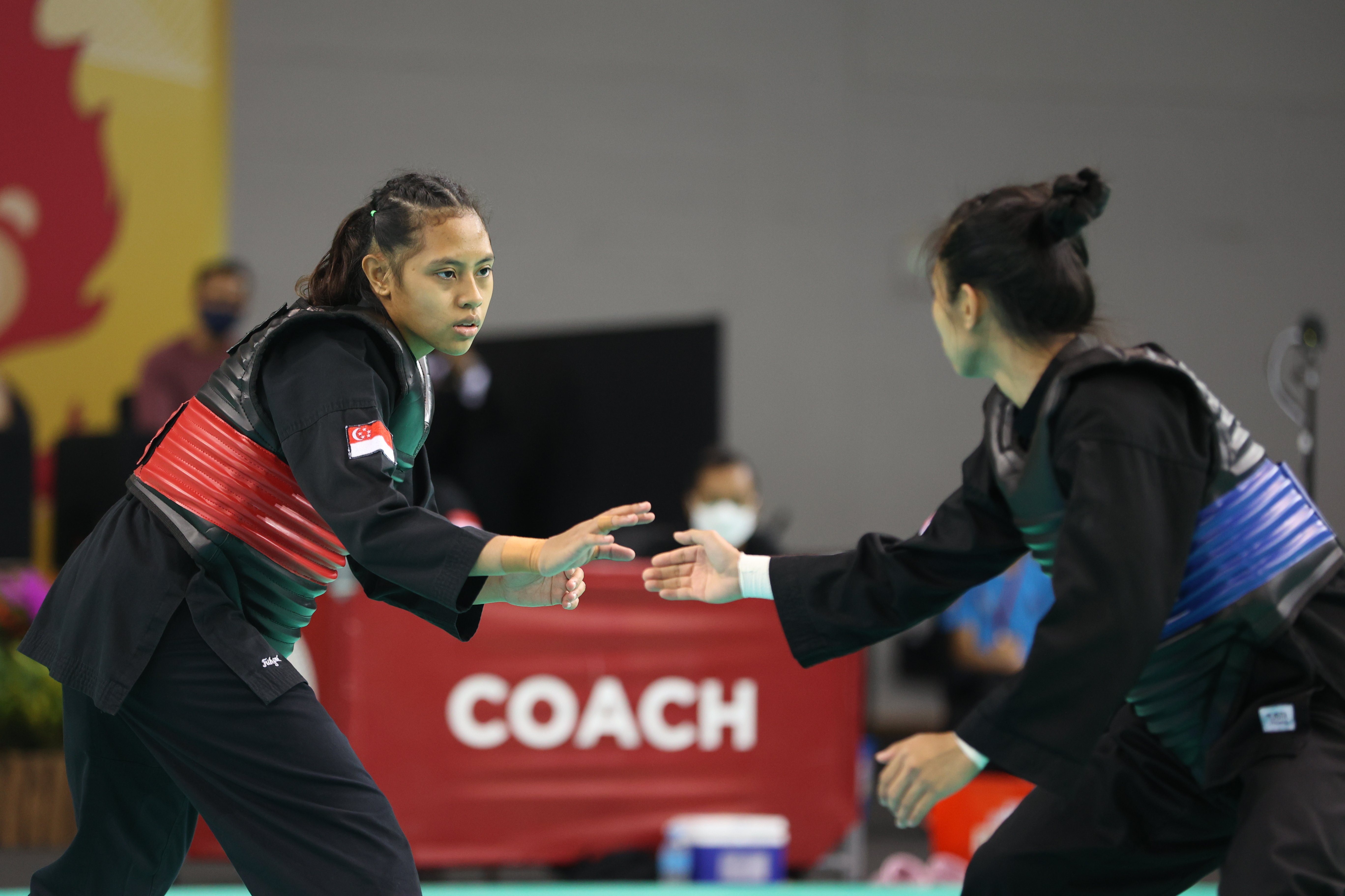 20220227_Nadhrah Binte Sahrin (left) of Singapore, Nor Farah Binti Mazlan (right) of Malaysia_Photo credit to Singapore Silat Federation