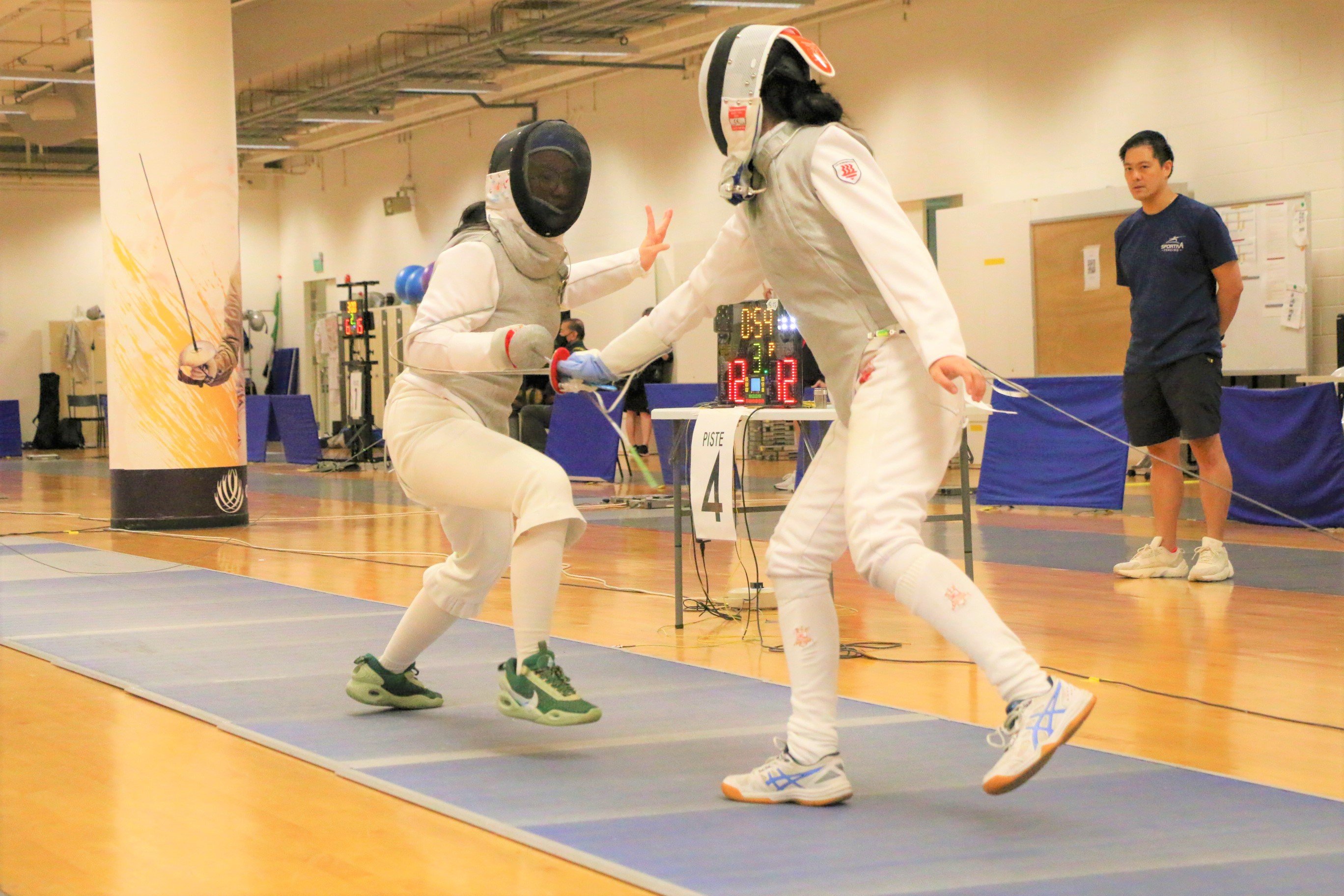 2023-04-20_NSG Fencing Womens Foil Div A_Photo by Anbumani(12)_KOH SUEANNE AMELIA vs LIM CAITLIN JINN YUIN (Elimination)