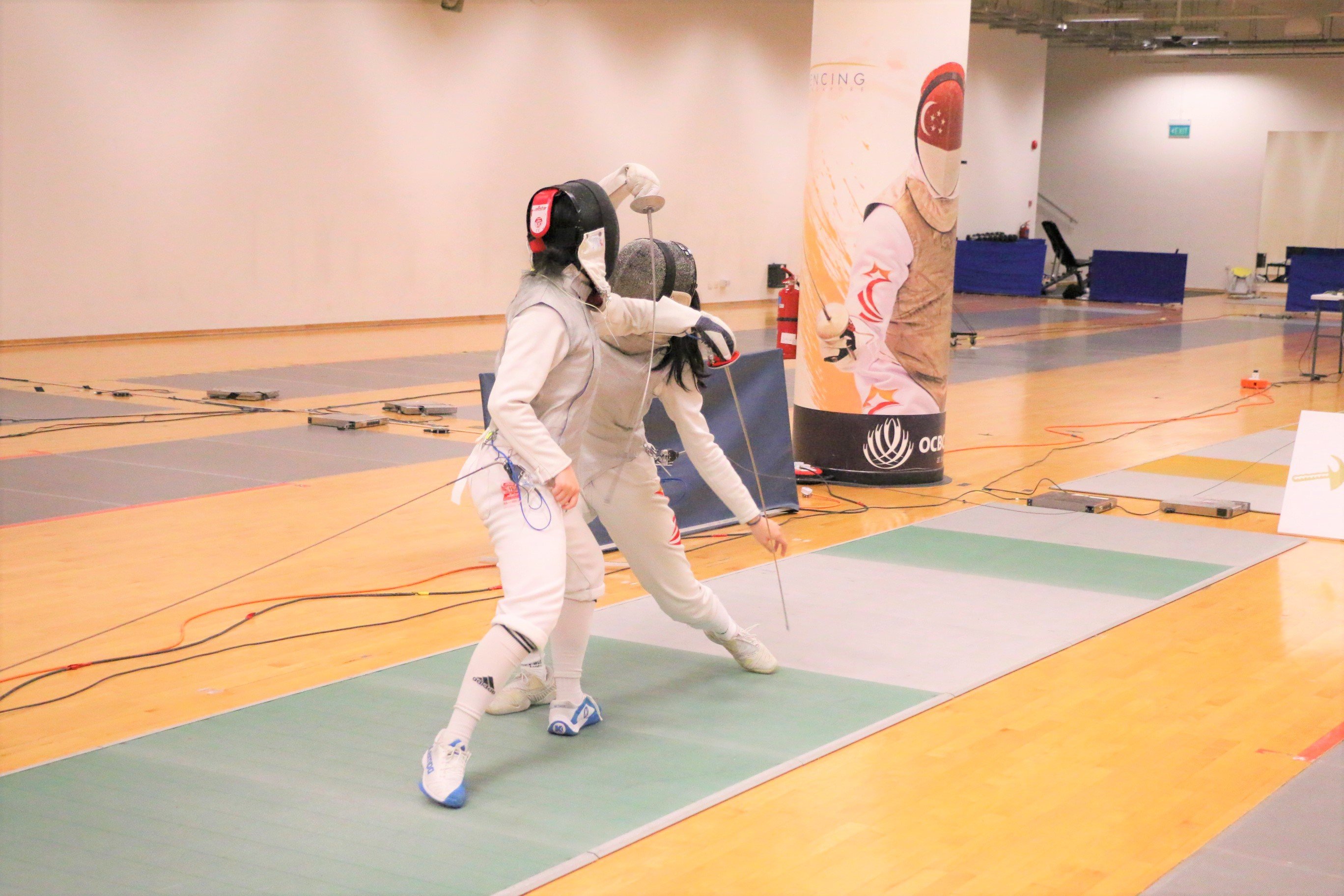 2023-04-20_NSG Fencing Womens Foil Div A_Photo by Anbumani(20)_LIA SWEE vs CHIA HALYN HIN TENG(Final)