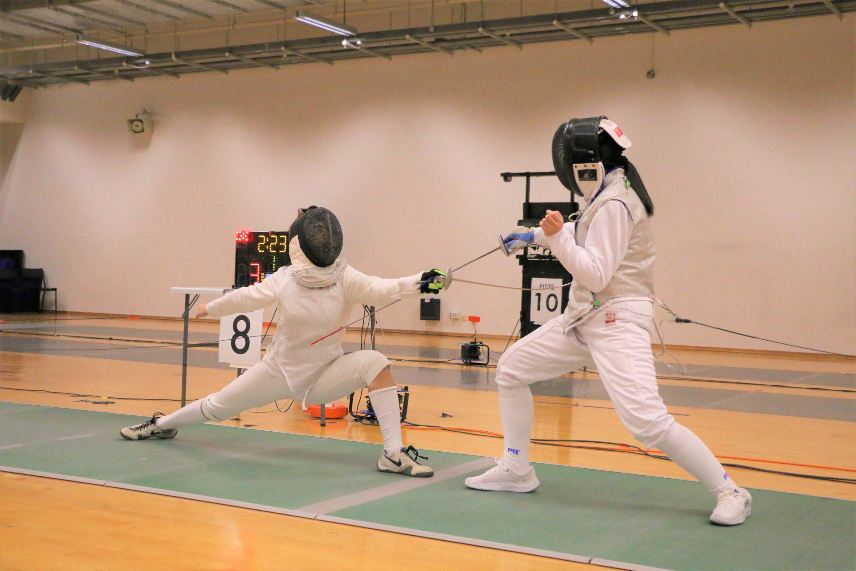 2023-04-20_NSG Fencing Womens Foil Div A_Photo by Anbumani(6)_LAI MISHKA SYIN YU vs SONG RUI QI GENEVIEVE (Elimination)