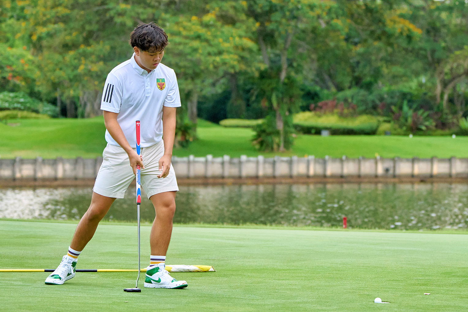 2024-04-15_NSG Golf Championship Master Course @Laguna Nationals_Photo by Eric Koh DSC07211  Goh Sheng Rui(RI) sinks the putt