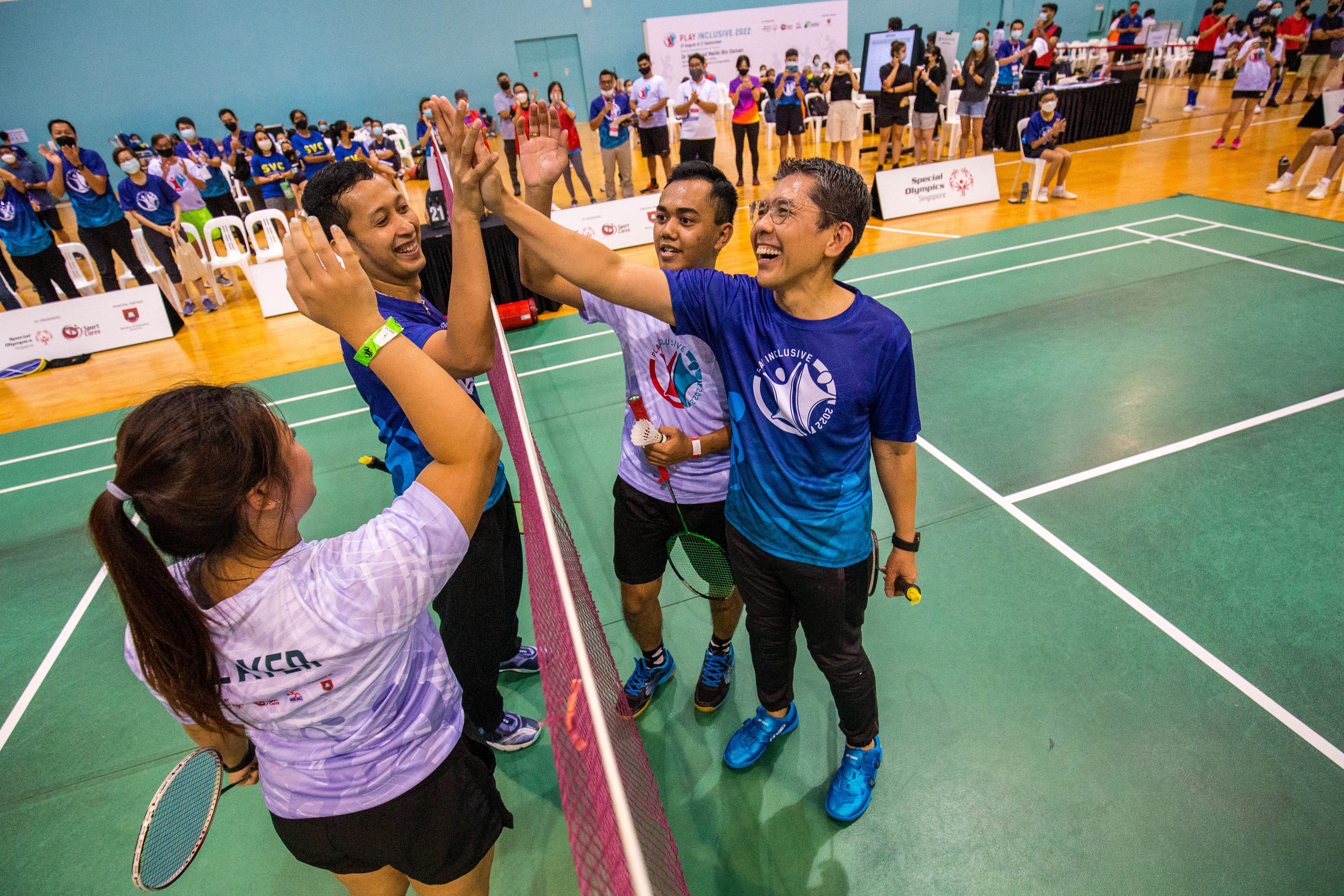 Dr Maliki with Special Olympics Singapore outreach athlete Muhd Haidil Bin Ismail, 21yrs, Unified Partner Ms. Faith Toh, volunteer with Special Olympics Singapore, 25yrs