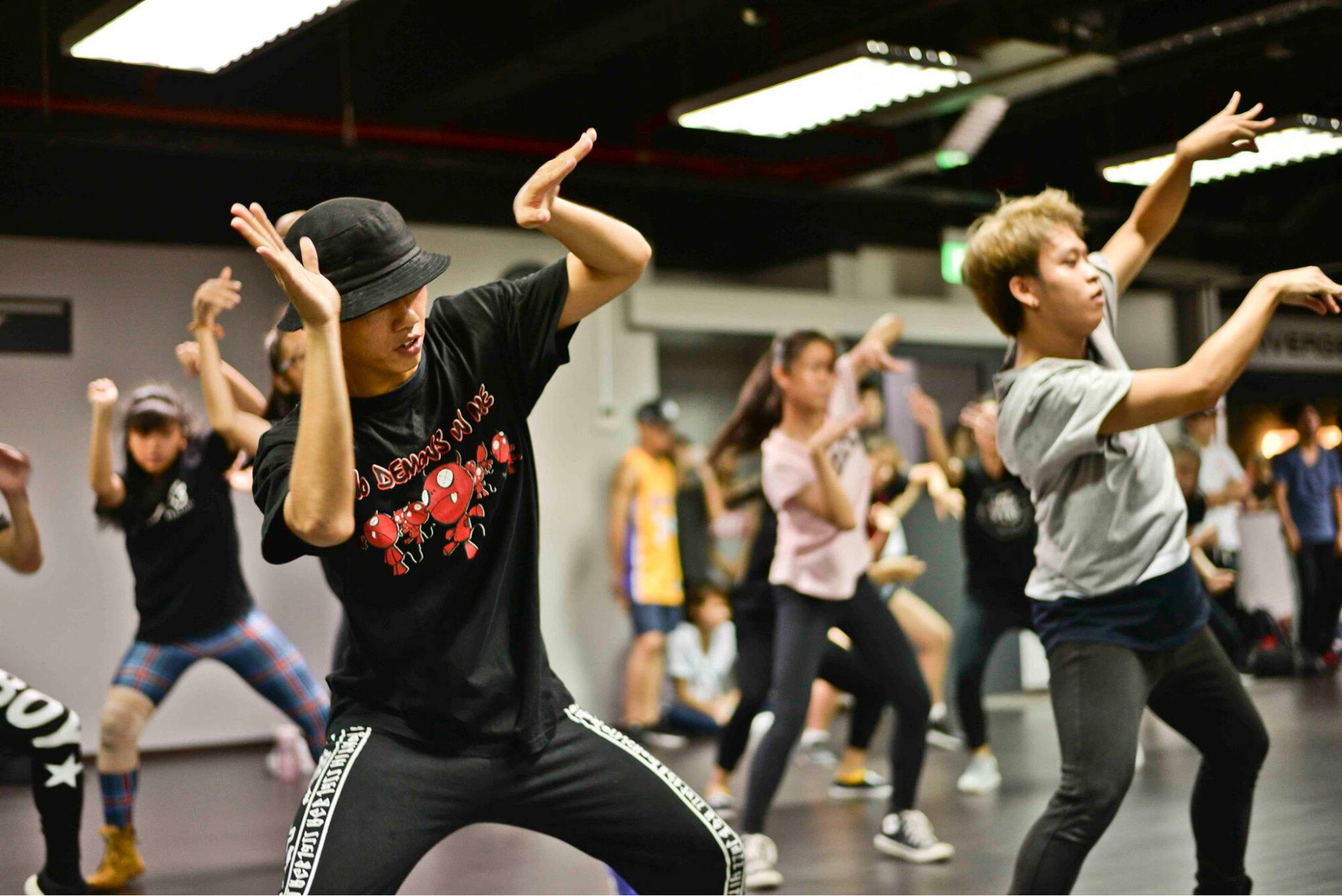 Instructor teaching dance class