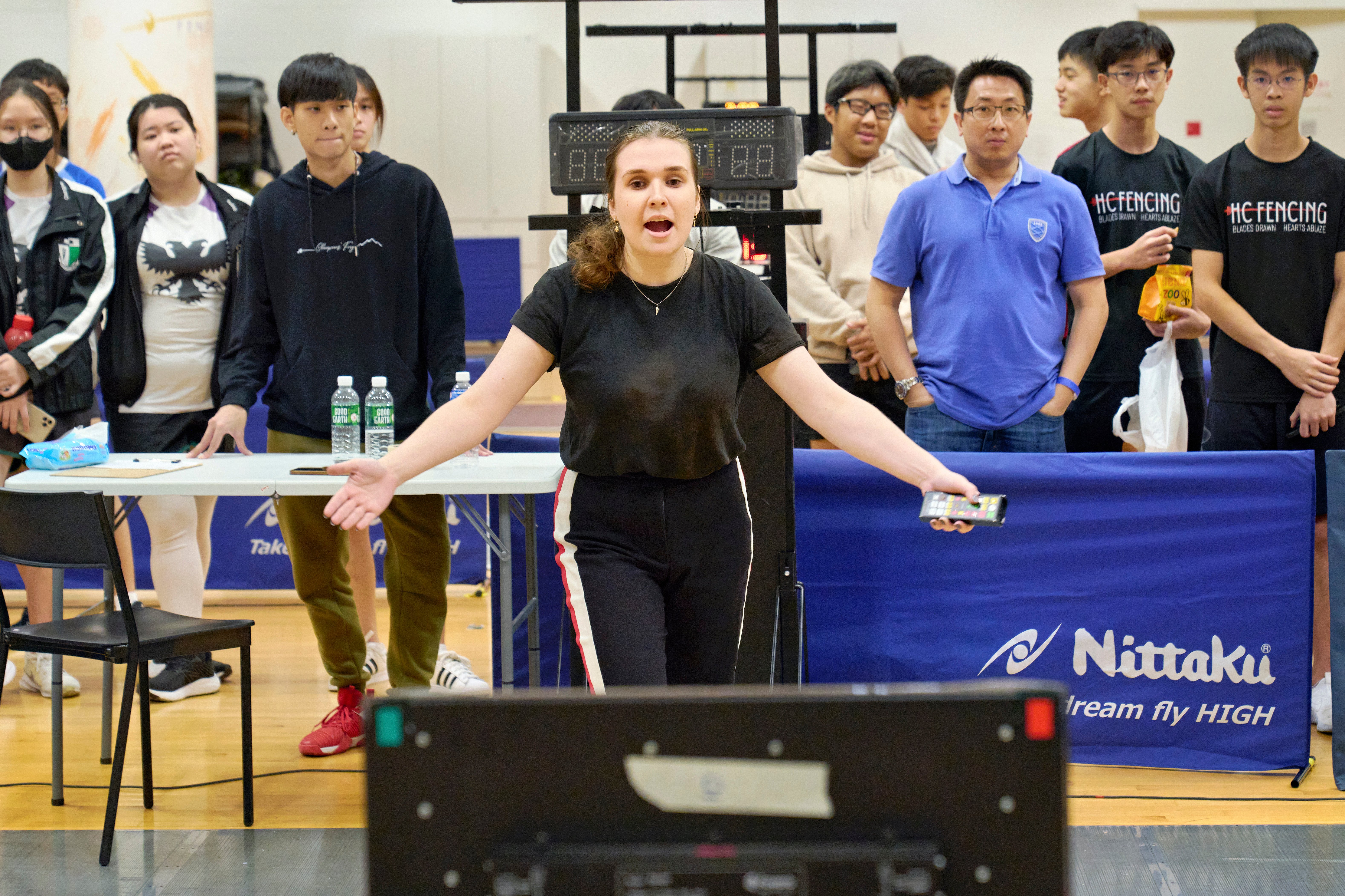 2023_04_20 Fencing Sabre A Div Boys Photo by Eric Koh, _Allez_ refree signals the start of the match DSC08524