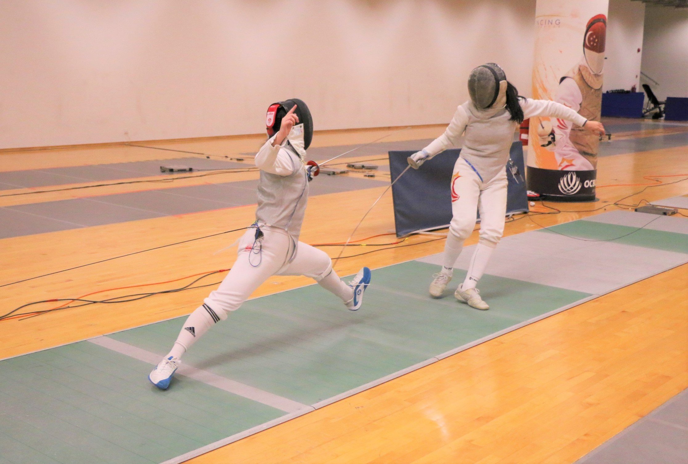 2023-04-20_NSG Fencing Womens Foil Div A_Photo by Anbumani(19)_LIA SWEE vs CHIA HALYN HIN TENG(Final)